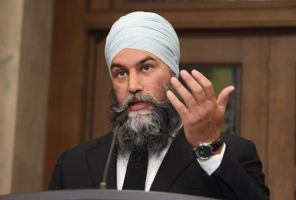 New Democratic Party Leader Jagmeet Singh speaks in the Foyer of the House of Commons about the NSICOP report, on Parliament Hill in Ottawa, on Thursday, June 13, 2024. The Conservative party released two new ads this week attacking NDP Leader Jagmeet Singh as a