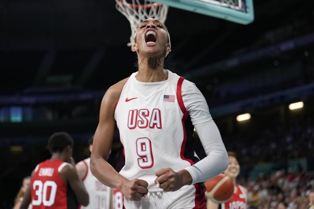 A'ja Wilson, of the Unites States, celebrates after scoring against Japan in a women's basketball game at the 2024 Summer Olympics, Monday, July 29, 2024, in Villeneuve-d'Ascq, France. (AP Photo/Mark J. Terrill)