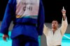 Canada's Shady Elnahas celebrates his win over Chile's Thomas Briceno during the men's 100kg judo gold medal match at the Pan American Games, in Santiago, Chile, Saturday, Oct. 21, 2023. Elnahas will be in action in the men's 100-kilogram elimination Round of 16. THE CANADIAN PRESS/Frank Gunn