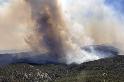This image provided by the USDA Forest Service shows the Alexander Mountain Fire near Loveland, Colo., Tuesday, July 30, 2024. (Jason Sieg/USDA Forest Service via AP)