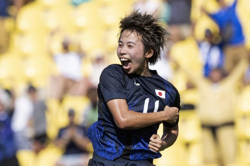 Japan's Mina Tanaka celebrates after scoring a goal during the women's Group C match between Japan and Nigeria at La Beaujoire Stadium during the 2024 Summer Olympics on Wednesday, July 31, 2024, in Nantes, France. (AP Photo/Jeremias Gonzalez)