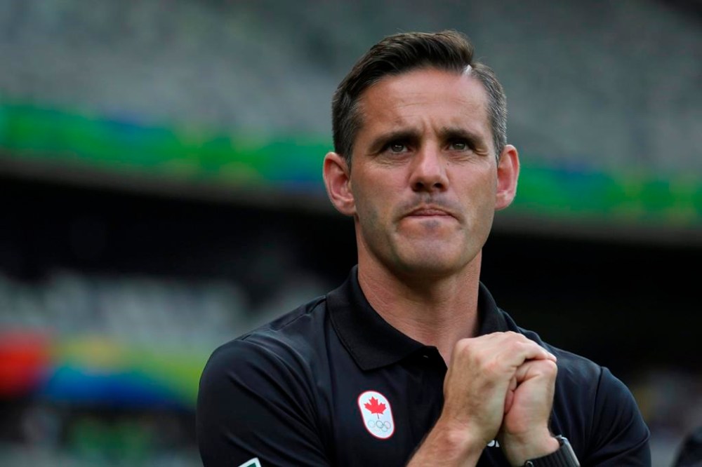 A ruling by the FIFA Appeals Committee puts former Canada coach John Herdman at Ground Zero within Canada Soccer for spying on rival teams.In this Aug. 16, 2016, file photo, Canada coach Herdman stands on the sideline during a semifinal match of the women's Olympic soccer tournament against Germany in Belo Horizonte, Brazil. (AP Photo/Eugenio Savio, File)