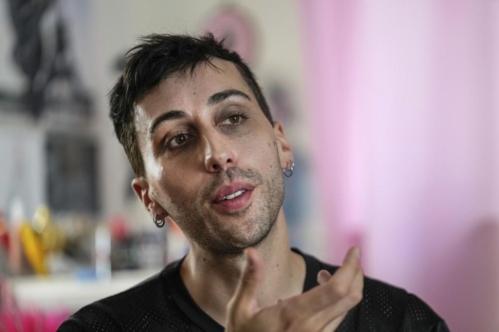 Hugo Bardin who performs as the drag queen Paloma speaks, during an interview with The Associated Press in Paris, France, Wednesday, July 31, 2024. (AP Photo/Michel Euler)
