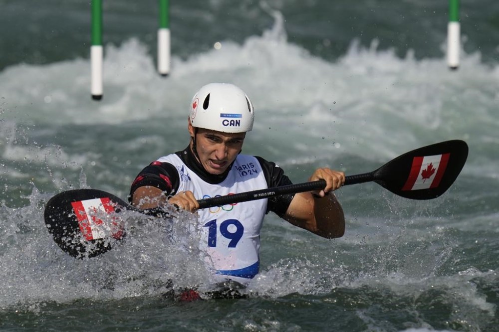 Alex Baldoni of Canada competes in the men's kayak single heats at the 2024 Summer Olympics, Tuesday, July 30, 2024, in Vaires-sur-Marne, France. THE CANADIAN PRESS/AP-Kirsty Wigglesworth