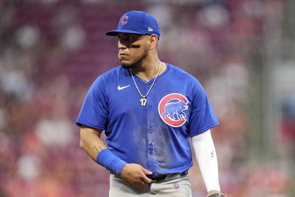 Chicago Cubs third baseman Isaac Paredes stands at third base during the sixth inning of a baseball game against the Cincinnati Reds, Tuesday, July 30, 2024, in Cincinnati. (AP Photo/Jeff Dean)