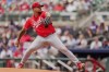 Cincinnati Reds pitcher Frankie Montas throws in the first inning of the first baseball game of a doubleheader against the Atlanta Braves, Wednesday, July 24, 2024, in Atlanta. (AP Photo/Jason Allen)