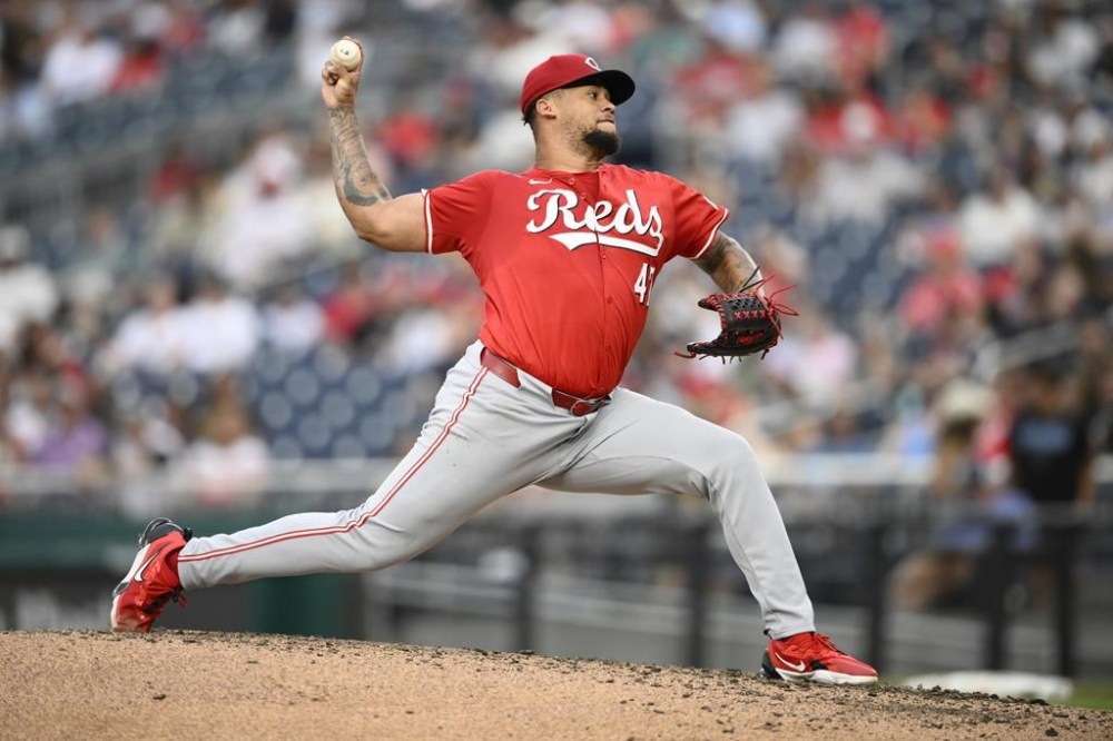 Cincinnati Reds starting pitcher Frankie Montas throws during the third inning of a baseball game against the Washington Nationals, Friday, July 19, 2024, in Washington. (AP Photo/Nick Wass)