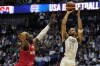 United States' forward Jayson Tatum throws the ball to score during an exhibition basketball game between the United States and Germany at the O2 Arena in London, Monday, July 22, 2024. (AP Photo/Alastair Grant)