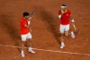 Carlos Alcaraz and Rafael Nadal of Spain compete against Austin Krajicek Rajeev Ram of the USA during the men's doubles quarter-final tennis competition at the Roland Garros stadium, at the 2024 Summer Olympics, Wednesday, July 31, 2024, in Paris, France. (AP Photo/Manu Fernandez)