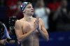 Leon Marchand, of France, reacts after winning the men's 200-meter butterfly final at the 2024 Summer Olympics, Wednesday, July 31, 2024, in Nanterre, France. (AP Photo/Petr David Josek)
