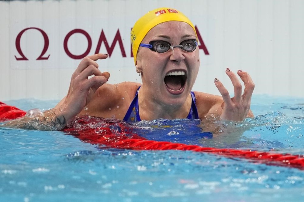 Sarah Sjoestroem, of Sweden, celebrates after winning the women's 100-meter freestyle final at the 2024 Summer Olympics, Wednesday, July 31, 2024, in Nanterre, France. (AP Photo/Petr David Josek)