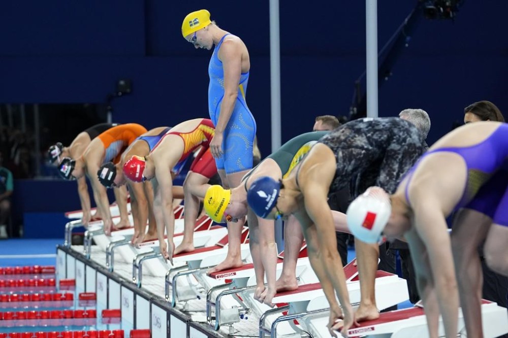 Sarah Sjoestroem, of Sweden, stands on the Strat blocks for her women's 100-meter freestyle semifinal at the 2024 Summer Olympics, Tuesday, July 30, 2024, in Nanterre, France. (AP Photo/Petr David Josek)