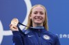 Evy Leibfarth of the United States celebrates with the bronze medal in the women's canoe single finals at the 2024 Summer Olympics, Wednesday, July 31, 2024, in Vaires-sur-Marne, France. (AP Photo/Kirsty Wigglesworth)
