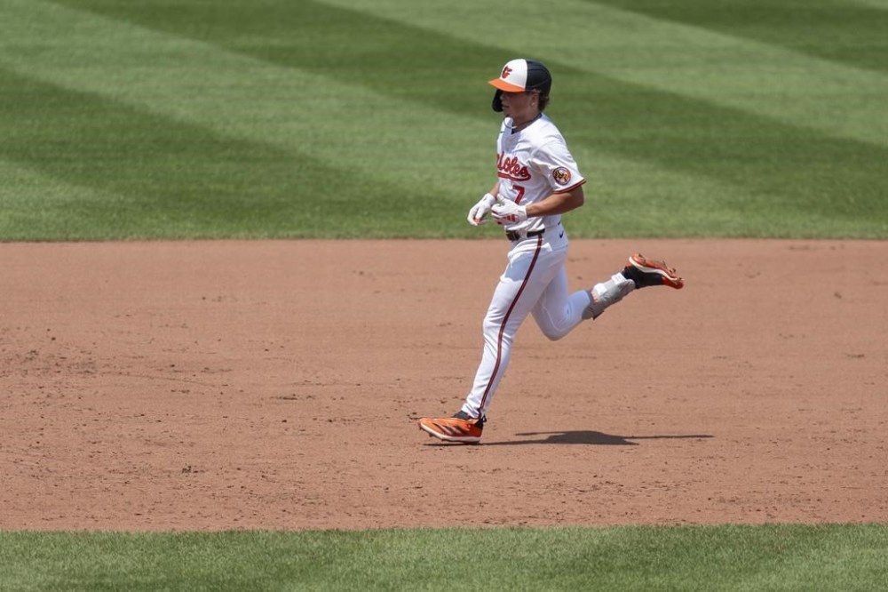 Baltimore Orioles' Jackson Holliday (7) rounds the bases after hitting a home run during the fifth inning of a baseball game against the Toronto Blue Jays, Wednesday, July 31, 2024, in Baltimore. (AP Photo/Stephanie Scarbrough)
