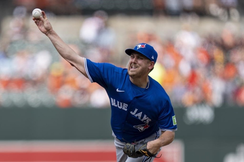 Toronto Blue Jays relief pitcher Erik Swanson delivers during the eighth inning of a baseball game against the Baltimore Orioles, Wednesday, July 31, 2024, in Baltimore. (AP Photo/Stephanie Scarbrough)
