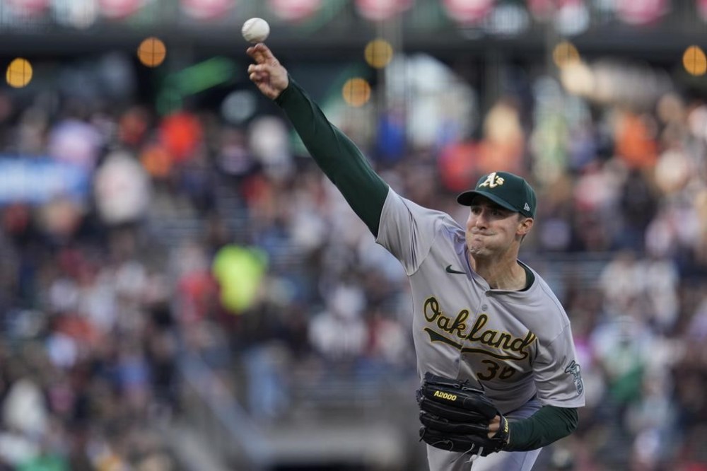 Oakland Athletics pitcher Ross Stripling throws to a San Francisco Giants batter during the first inning of a baseball game Wednesday, July 31, 2024, in San Francisco. (AP Photo/Godofredo A. Vásquez)