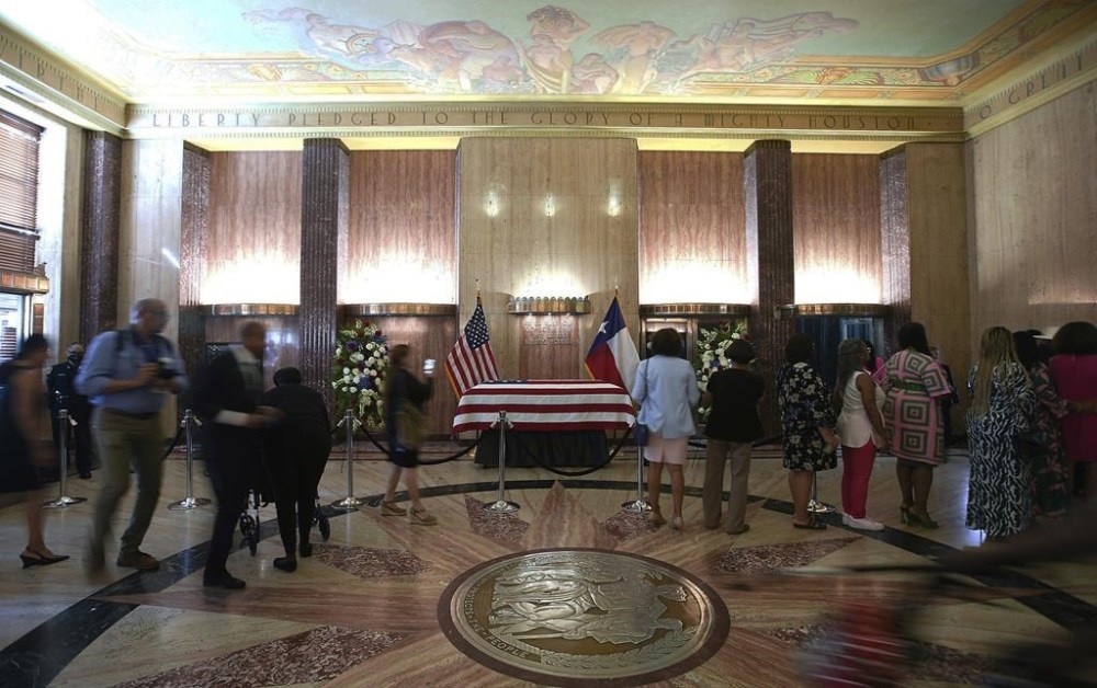 People pay their respect to the late Congresswoman Sheila Jackson Lee as they file past her casket in the rotunda of Houston City Hall on Monday, July 29, 2024, in Houston. Jackson Lee died on July 19 after battling pancreatic cancer. (Elizabeth Conley/Houston Chronicle via AP, Pool)
