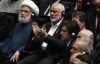 FILE - Hamas chief Ismail Haniyeh claps as newly-elected Iranian President Masoud Pezeshkian speaks while deputy leader of the Lebanese militant group Hezbollah, Sheikh Naim Kassem, left, sits during the swearing-in ceremony of Pezeshkian at the Iranian parliament, in Tehran, Iran, Tuesday, July 30, 2024. Two back-to-back strikes in Beirut and Tehran, both attributed to Israel and targeting high-ranking figures in Hezbollah and Hamas, have left Hezbollah and Iran in a quandary. (AP Photo/Vahid Salemi, File)