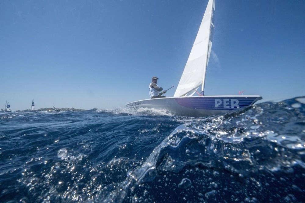 Peru's Stefano Peschiera Loret de Mola sails during practice in the men's dinghy event at the 2024 Summer Olympics, Friday, July 26, 2024, in Marseille, France. (AP Photo/Jacquelyn Martin)