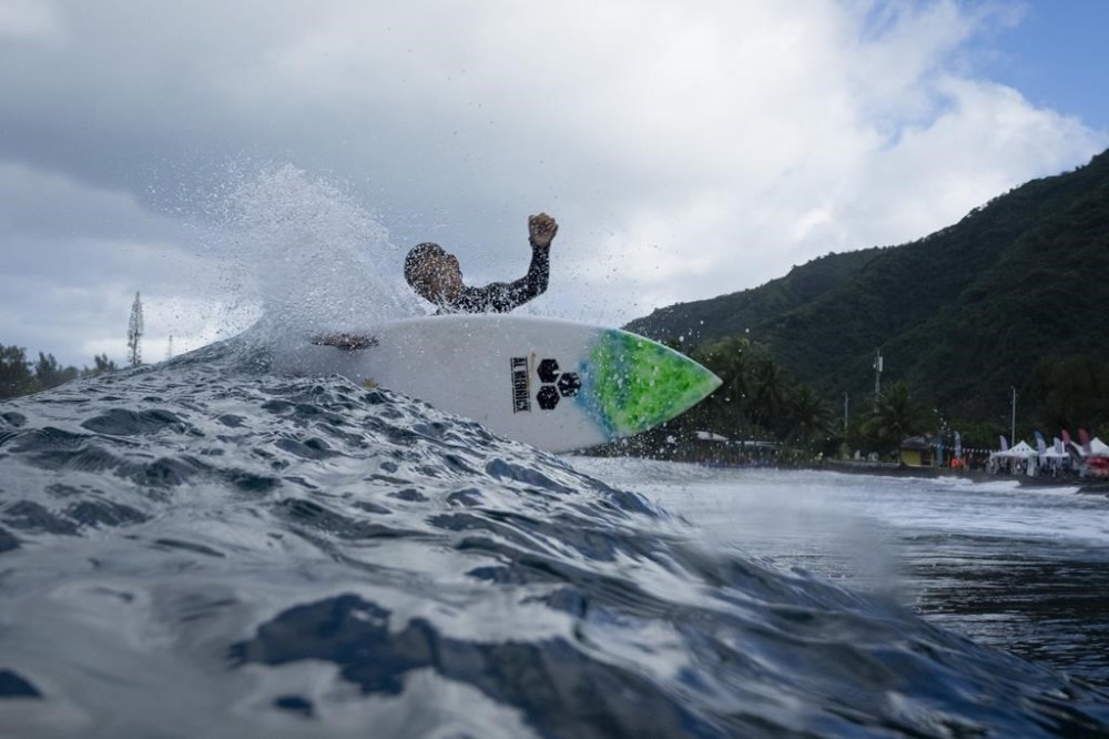 Tauirai Henriou Oopa, 10, surfs his home shore break during a break in the 2024 Summer Olympics surfing competition, Wednesday, July 31, 2024, in Teahupo'o, Tahiti. While Teahupo'o has been a coveted destination for surfers from around the world for decades, it's only in more recent years that local surf culture and talent has begun to develop across Tahiti. (AP Photo/Gregory Bull)