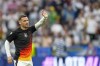 FILE - Germany's Pascal Gross waves to fans during the warm up prior to the Group A match between Germany and Scotland at the Euro 2024 soccer tournament in Munich, Germany, on June 14, 2024. Champions League runner-up Borussia Dortmund signed Gross from Brighton on Thursday, Aug. 1, 2024 adding depth and experience to its midfield. (AP Photo/Antonio Calanni, File)
