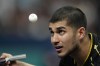 United States' Jha Kanak plays against China's Fan Zhendong during a men's singles round of 16 table tennis game at the 2024 Summer Olympics, Wednesday, July 31, 2024, in Paris, France. (AP Photo/Petros Giannakouris)