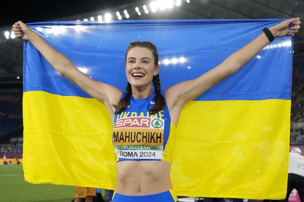 FILE - Yaroslava Mahuchikh, of Ukraine, smiles after winning the gold medal in the women's high jump final at the European Athletics Championships in Rome, June 9, 2024. (AP Photo/Andrew Medichini, File)