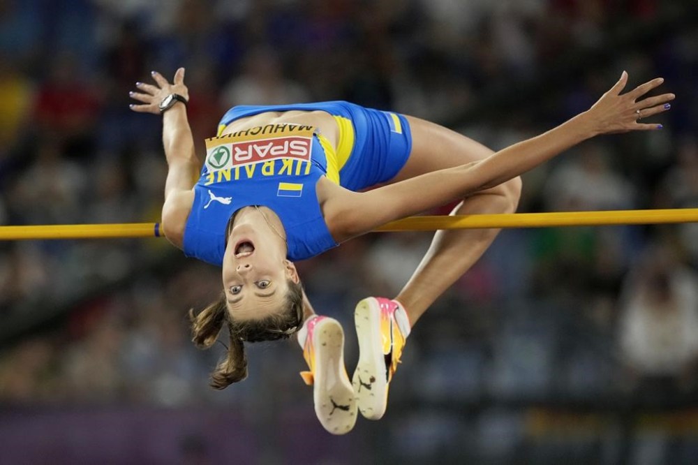 FILE - Yaroslava Mahuchikh, of Ukraine, makes an attempt in the women's high jump final at the the European Athletics Championships in Rome, June 9, 2024. (AP Photo/Andrew Medichini, File)