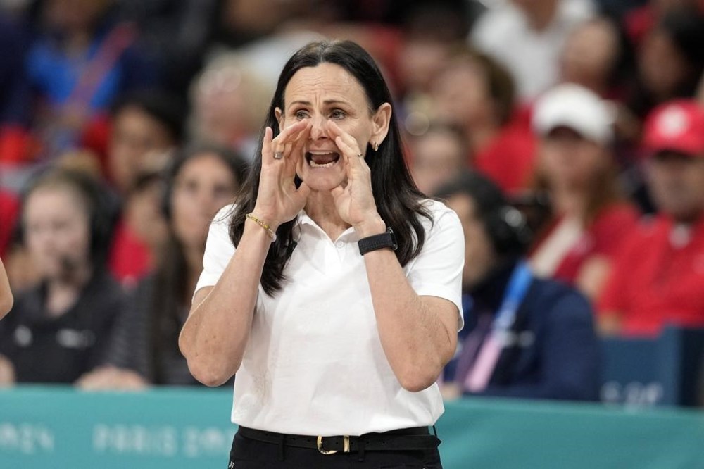 Australia head coach Sandy Brondello yells to her team during a women's basketball game against Canada at the 2024 Summer Olympics, Thursday, Aug. 1, 2024, in Villeneuve-d'Ascq, France. (AP Photo/Michael Conroy)