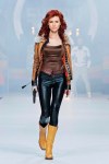 FILE - Anna Chapman, who was deported from the U.S. on charges of espionage, displays a creation by Russian designers Shiyan & Rudkovskaya during a Fashion Week in Moscow, Russia on Sunday, April 3, 2011. In June 2010, U.S. officials rounded up 10 Russians, including Chapman, alleged to be 