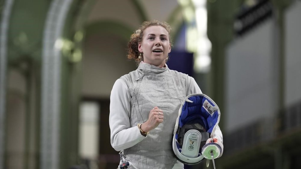 Canada's Eleanor Harvey celebrates after winning the women's team foil quarterfinal match against France during the 2024 Summer Olympics at the Grand Palais, Thursday, Aug. 1, 2024, in Paris, France. THE CANADIAN PRESS/AP /Rebecca Blackwell