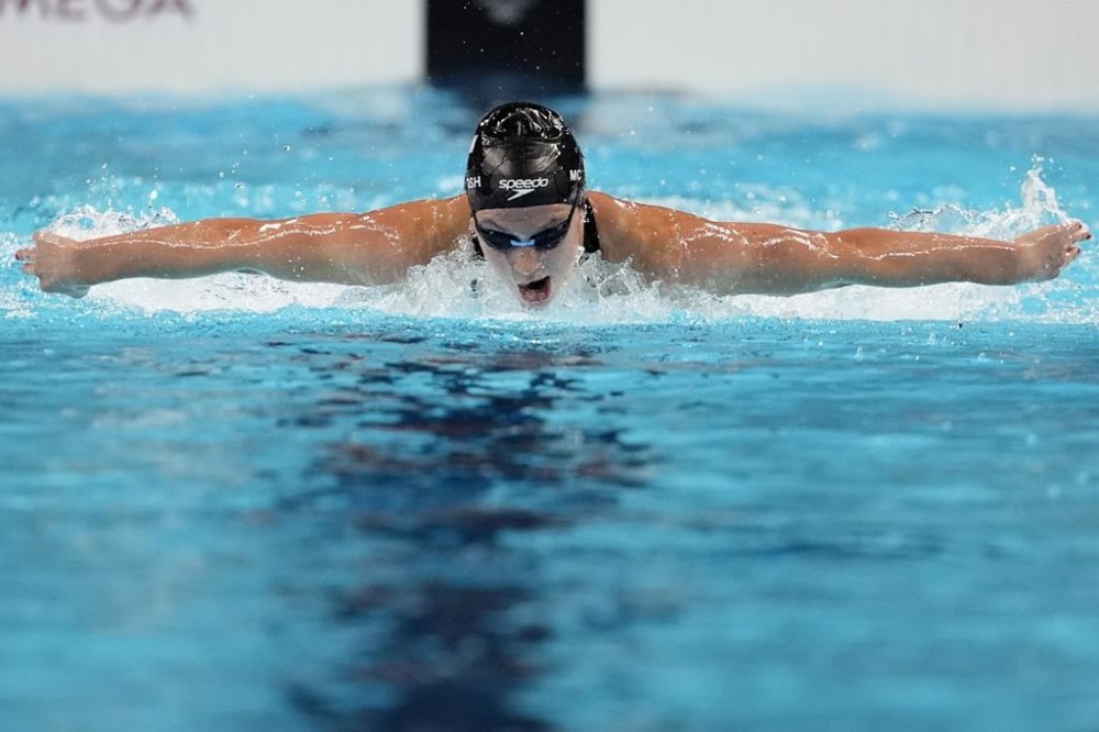 Summer McIntosh, of Canada, competes in the women's 200-meter butterfly final at the 2024 Summer Olympics, Thursday, Aug. 1, 2024, in Nanterre, France. (AP Photo/Matthias Schrader)