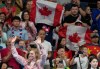Canada's Summer McIntosh, of Toronto, acknowledges the crowd as she receives her gold medal after competing in the 200m women's butterfly final during the 2024 Summer Olympic Games, in Paris, Thursday, Aug. 1, 2024. THE CANADIAN PRESS/Christinne Muschi