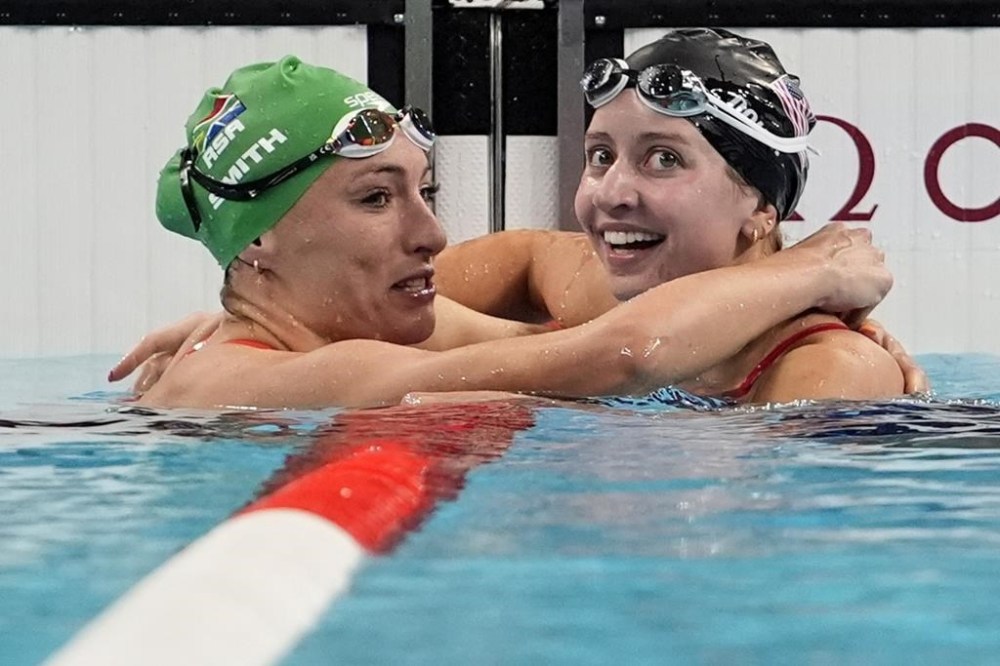Kate Douglass, right, of the United States, is congratulated by Tatjana Smith, of South Africa, after winning the women's 200-meter breaststroke final at the 2024 Summer Olympics, Thursday, Aug. 1, 2024, in Nanterre, France. (AP Photo/Matthias Schrader)