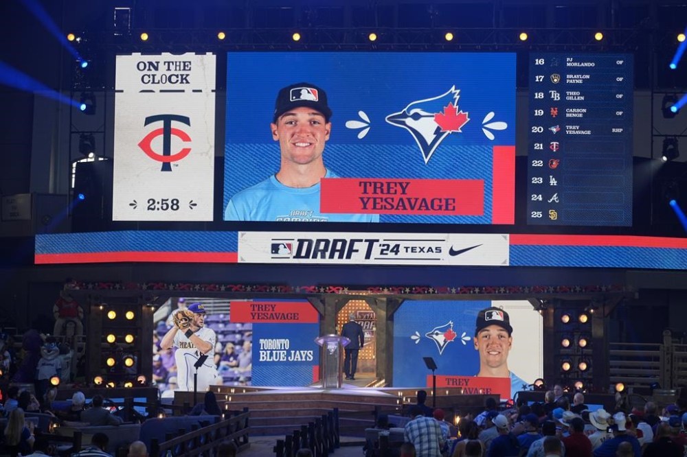 The Toronto Blue Jays have signed 2024 first-round pick Trey Yesavage, the club announced Thursday. A photo of Yesavage is shown on the video board after he was selected 20th overall by the Toronto Blue Jays in the first round of the MLB baseball draft in Fort Worth, Texas, Sunday, July 14, 2024. THE CANADIAN PRESS/AP-LM Otero