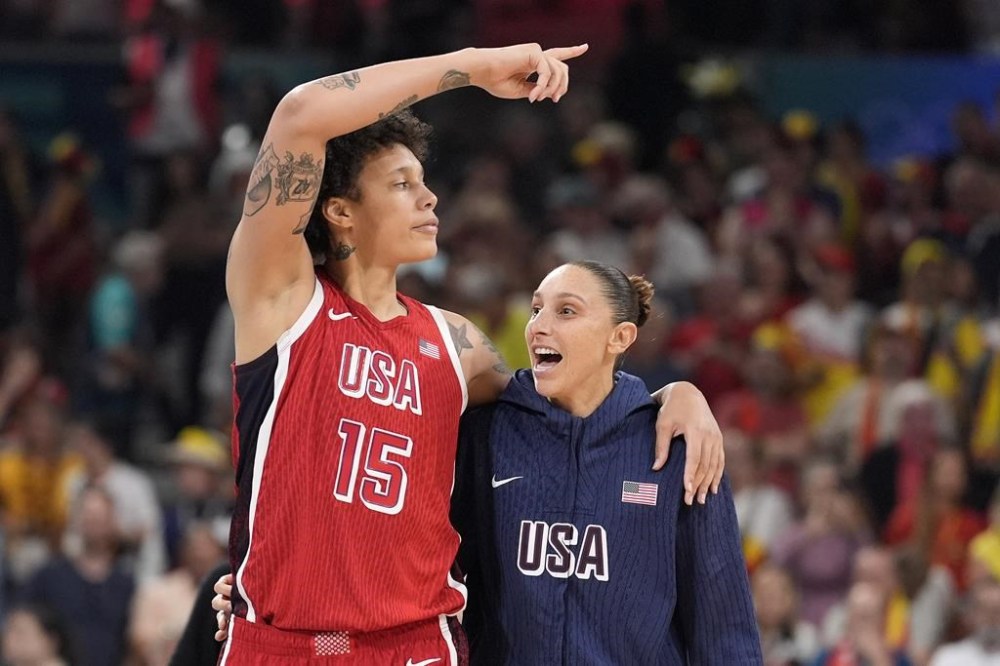 United States' Brittney Griner, left, and United States' Diana Taurasi walk off the court after the United States defeated Belgium in a women's basketball game at the 2024 Summer Olympics, Thursday, Aug. 1, 2024, in Villeneuve-d'Ascq, France. (AP Photo/Michael Conroy)