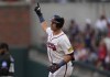 Atlanta Braves' Austin Riley gestures as he rounds the bases after hitting as solo-home rin in the first inning of a baseball game against the Miami Marlins, Thursday, Aug. 1, 2024, in Atlanta. (AP Photo/John Bazemore)