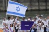FILE — Israel's Andrea Murez and Peter Paltchik carry their country's flag in Paris, France, during the opening ceremony of the 2024 Summer Olympics, Friday, July 26, 2024. (AP Photo/Kirsty Wigglesworth, File)