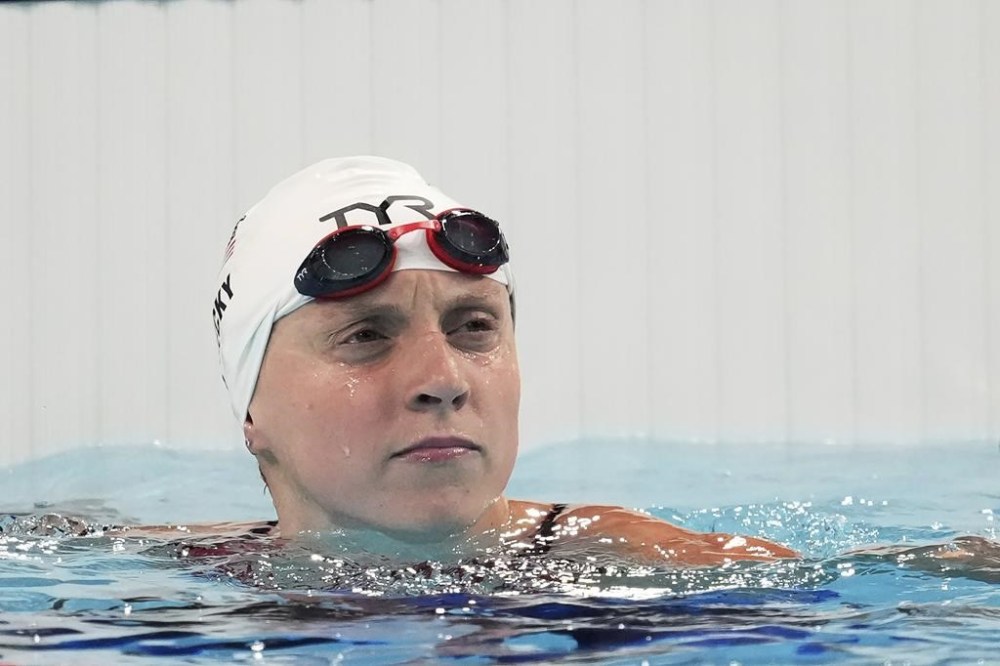 United States' Katie Ledecky looks at the board after winning a women's 800-meter freestyle heat at the Summer Olympics in Nanterre, France, Friday, Aug. 2, 2024. (AP Photo/Ashley Landis)