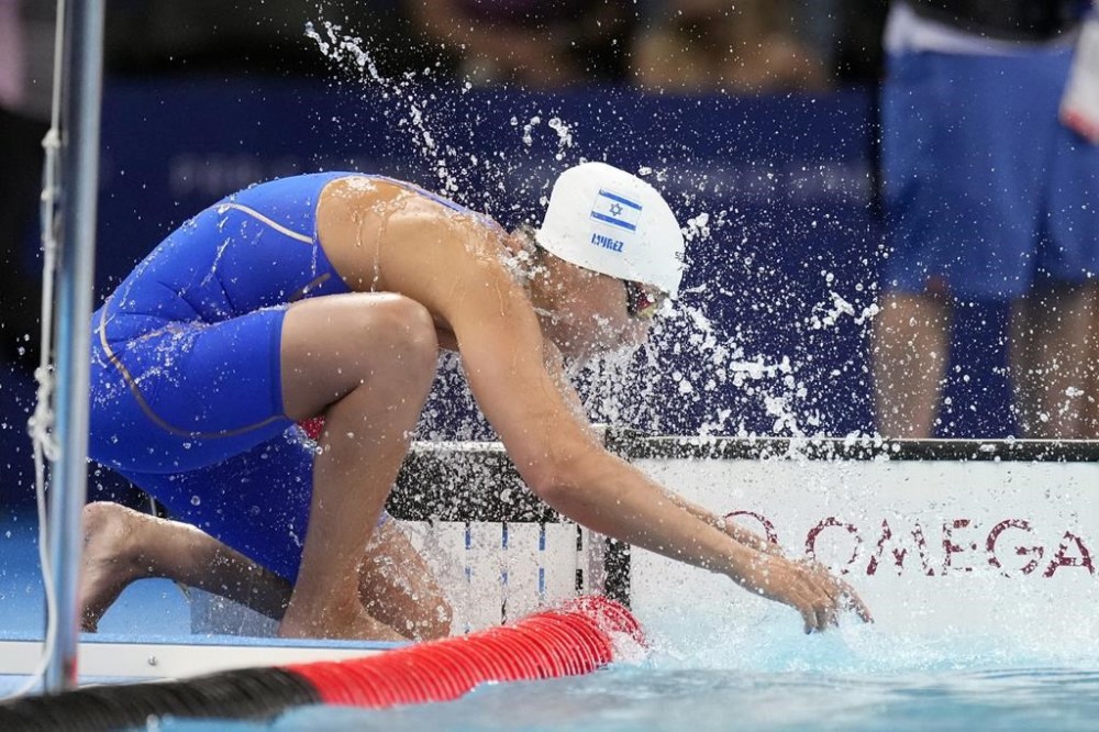 Israel's Andrea Murez prepares for her leg of the 4x100-meter mixed medley relay at the 2024 Summer Olympics, Friday, Aug. 2, 2024, in Nanterre, France. (AP Photo/Natacha Pisarenko)