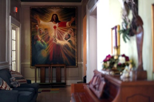 A large painting of Jesus hangs in the Paul Stefan Foundation maternity home in Orange, Virginia, on Friday, January 5, 2024. (AP Photo/Jessie Wardarski)