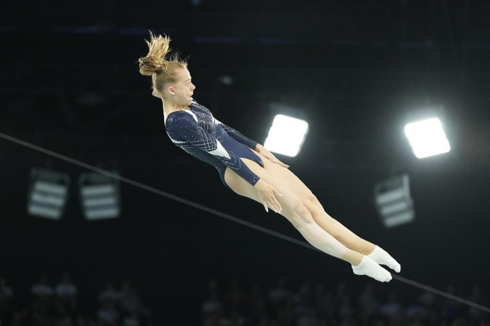 Viyaleta Bardzilouskaya of Individual Neutral Athletes competes during the women's trampoline qualification round in Bercy Arena at the 2024 Summer Olympics, Friday, Aug. 2, 2024, in Paris, France. (AP Photo/Charlie Riedel)