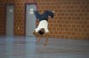 Keith Kanga breakdances in a gymnasium at the 2024 Summer Olympics, Tuesday, July 30, 2024, in Paris, France. (AP Photo/Yasin Dar)