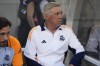 Real Madrid coach Carlo Ancelotti sits on the bench before a friendly soccer match against AC Milan, Wednesday, July 31, 2024, in Chicago. (AP Photo/Erin Hooley)