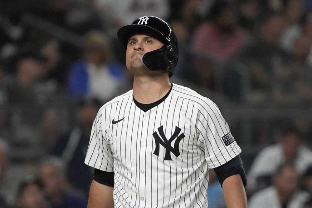 New York Yankees' J.D. Davis reacts after striking out during the sixth inning of a baseball game against the New York Mets, Wednesday, July 24, 2024, in New York. (AP Photo/Pamela Smith)
