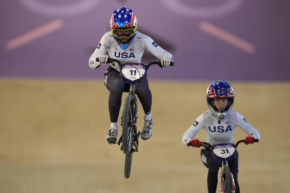 Alise Willoughby of the United States, left, and Daleny Vaughn of the United States, practice before a BMX racing event, at the 2024 Summer Olympics, Friday, Aug. 2, 2024, in Saint-Quentin-en-Yvelines, France. (AP Photo/Ricardo Mazalan)