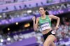 Layla Almasri, of Palestine, competes in a women's 800 meters round 1 heat at the 2024 Summer Olympics, Friday, Aug. 2, 2024, in Saint-Denis, France. (AP Photo/Bernat Armangue)