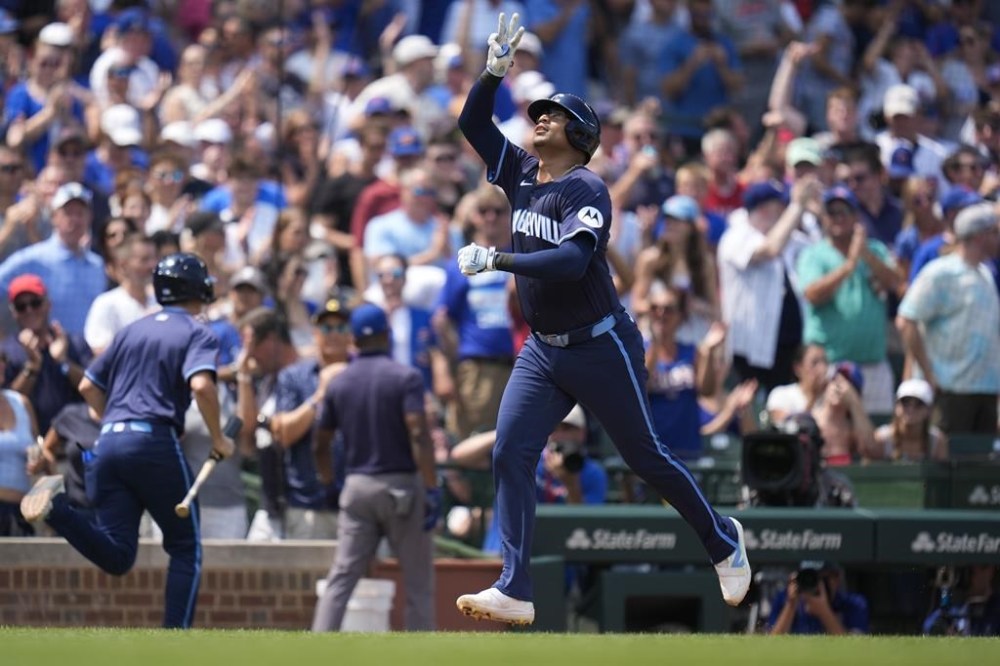 Chicago Cubs' Christian Bethancourt runs the bases after hitting a three-run home run during the second inning of a baseball game against the St. Louis Cardinals, Friday, Aug. 2, 2024, in Chicago. (AP Photo/Erin Hooley)