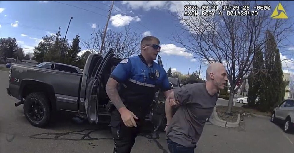 FILE - In this photo made from body camera footage and released by the Twin Falls, Idaho, Police Department, Skylar Meade, right, is arrested in Twin Falls on Thursday, March 21, 2024. An Idaho prosecutor says he will seek the death penalty against an Idaho inmate charged with killing a man while he was on the lam during a 36-hour escape from prison. (Twin Falls Police Department via AP, File)