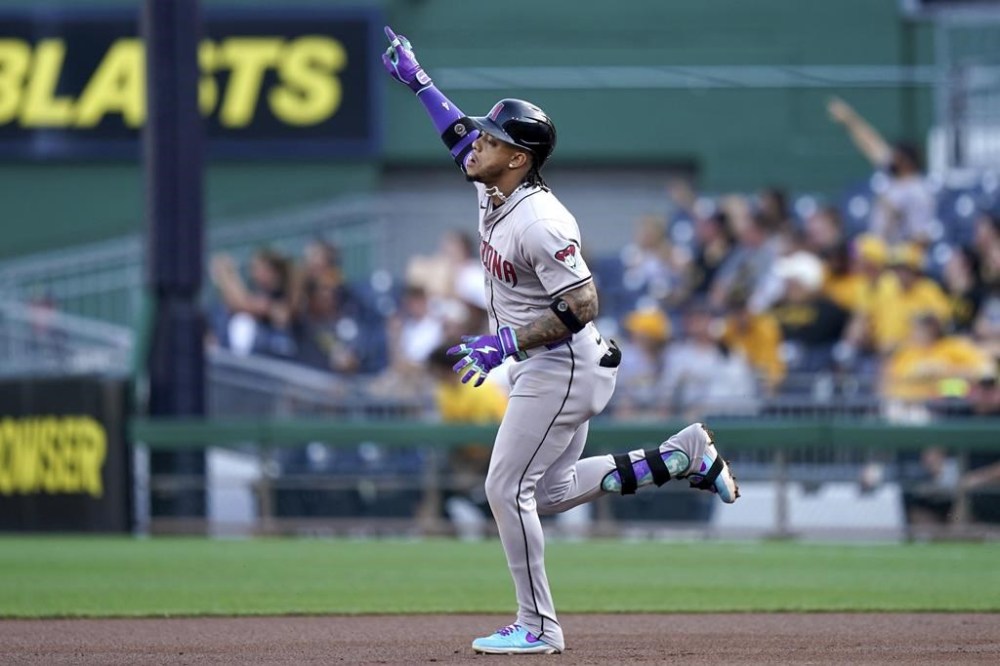Arizona Diamondbacks' Ketel Marte rounds the bases after hitting a home run during the first inning of a baseball game against the Pittsburgh Pirates, Friday, Aug. 2, 2024, in Pittsburgh. (AP Photo/Matt Freed)